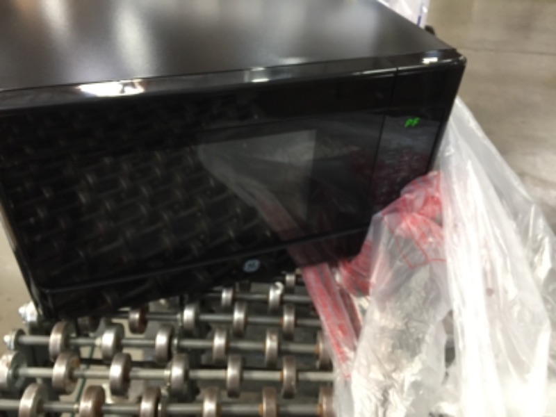 Photo 2 of E
1.1 cu. ft. Countertop Microwave in Black