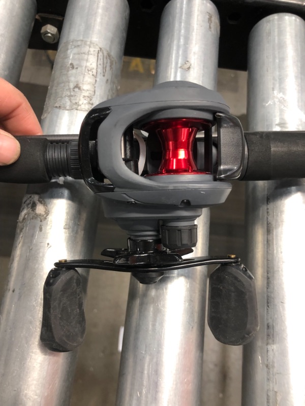 Photo 1 of Quantum Invade Baitcast Reel and Fishing Rod Combo, 6'6" IM6 Graphite 1-Piece Rod with Comfortable Split-Grip EVA Handle, 5 Bearings (4 + Continuous Anti-Reverse Clutch), Gray/Red
