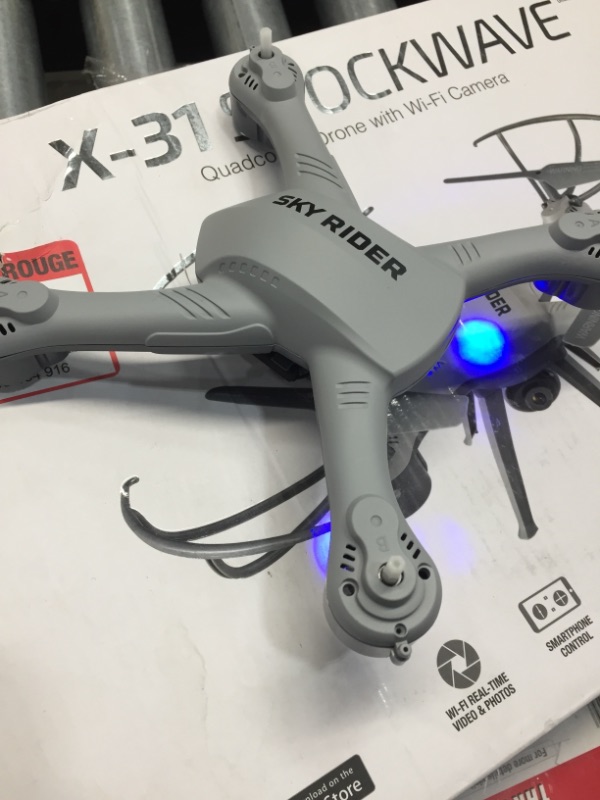 Photo 2 of SKY RIDER
Pro Quadcopter Drone with Wi-Fi Camera, Remote and Phone Holder

//missing hardware//powers on//remote needs to be charged 