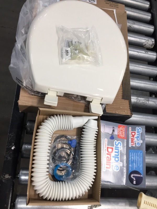 Photo 1 of 1.25 in. Rubber Threaded P-Trap Bathroom Single Sink Drain Kit
and
BEMIS
Affinity Round Closed Front Toilet Seat in Biscuit

//sold as is 