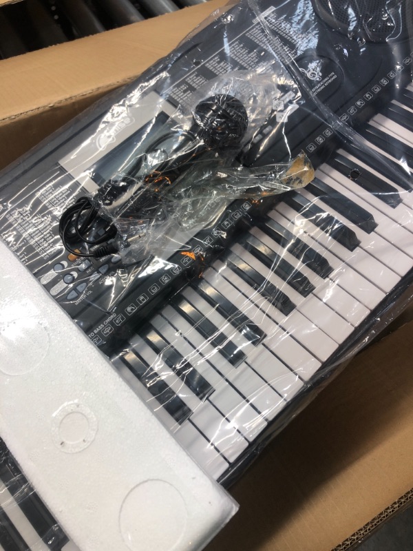 Photo 1 of Keyboard Piano 61 Key,Kmise Digital Piano Portable Electronic Keyboard for Professionals Beginners Kids w/Built-In Speaker,Microphone,Music Stand
