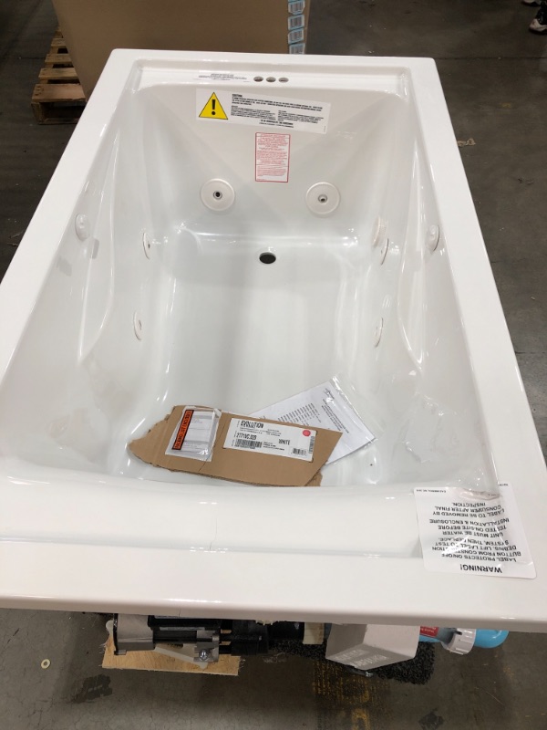 Photo 2 of **CRACKED** American Standard Evolution 60 in. X 36 in. Whirlpool Tub with EverClean Reversible Drain in White
