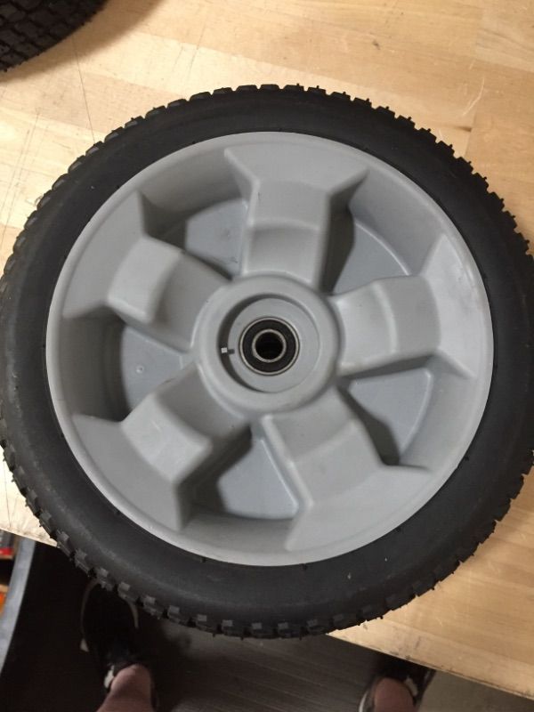 Photo 3 of 125-2509 Toro 10 inch wheel with gear assembly
