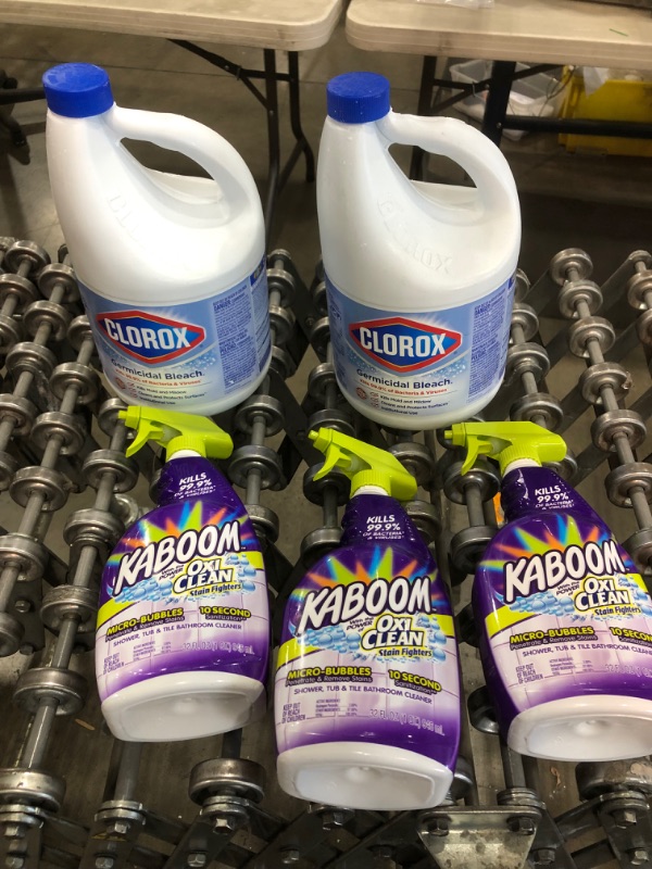 Photo 1 of 2 bottles of bleach and 23 bottles of kaboom cleaning products, no refunds or returns 