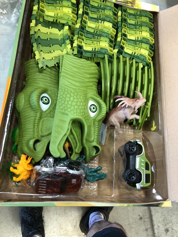 Photo 1 of Dinosaur Toys,Wuayur 240pcs Dinosaur Theme World Race Toy Set for Kids,240 Flexible Track Playset ,2 Cars,8 Dinosaurs and 2 Dinosaur Heads, Christmas Birthday Gift for 3 4 5 6 7 Year Old boy Girls
