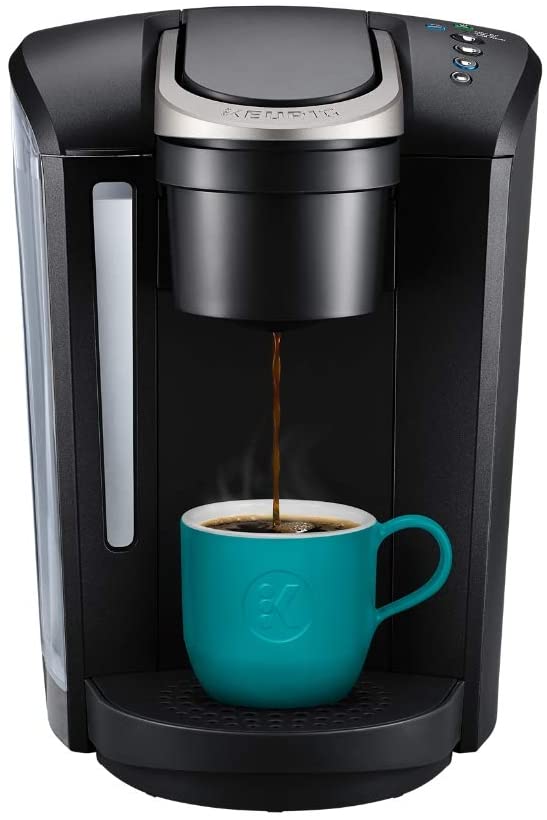 Photo 1 of kEURIG K-SELECT coffee maker single serve k-cup pod coffee brewer with strength control and hot water on demand, matte black (minor skrattes in the back)
