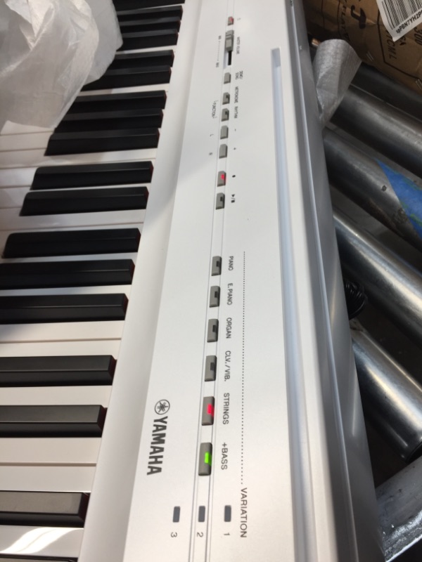 Photo 7 of **DAMAGED**
Yamaha P125 88-Key Weighted Action Digital Piano with Power Supply and Sustain Pedal, White
