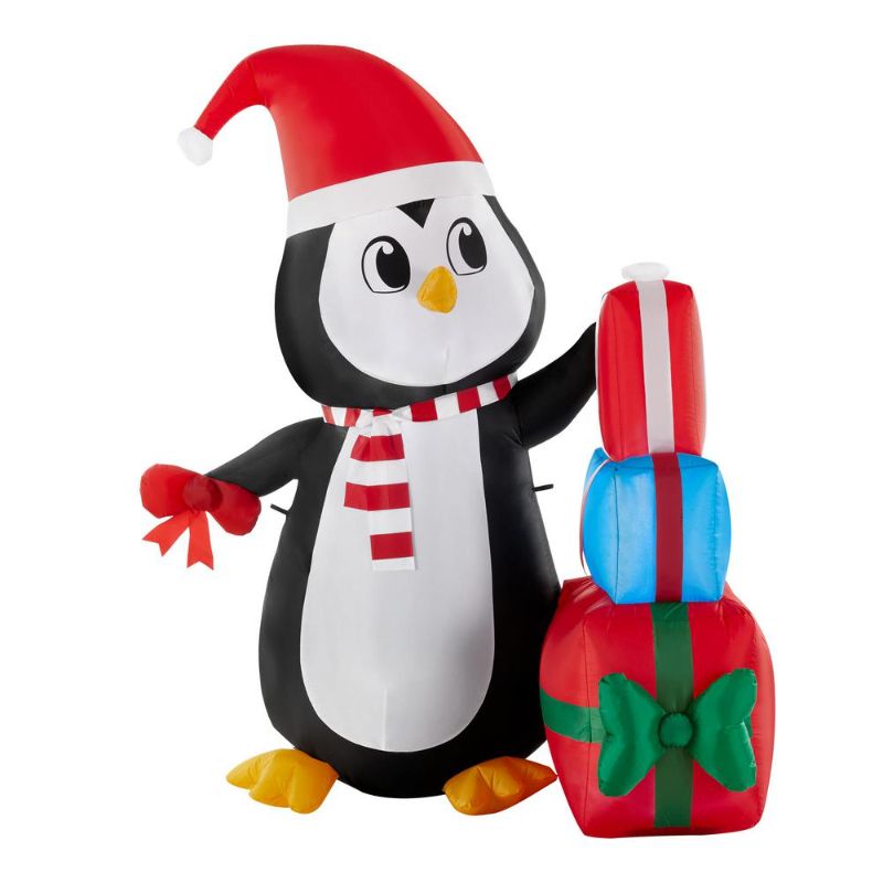 Photo 1 of *** NON FUNCVTIONAL*** Home Accents Holiday 5 Ft Pre-Lit LED Airblown Penguin with Gift Stack Scene Christmas Inflatable
