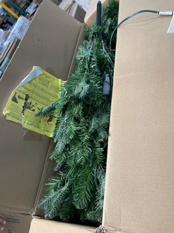 Photo 2 of **LIGHTS DO NOT WORK** National Tree Company Pre-Lit 'Feel Real' Slim Artificial Christmas Tree, Prescott Fir, Green, White Lights, Includes Stand, 7.5 Feet
