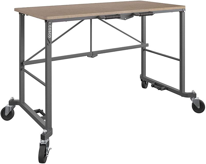 Photo 1 of Cosco 66720DKG1E Smartfold Portable Folding MDF Work top (Gray, 350 pounds) Workbench Desk, Tan
