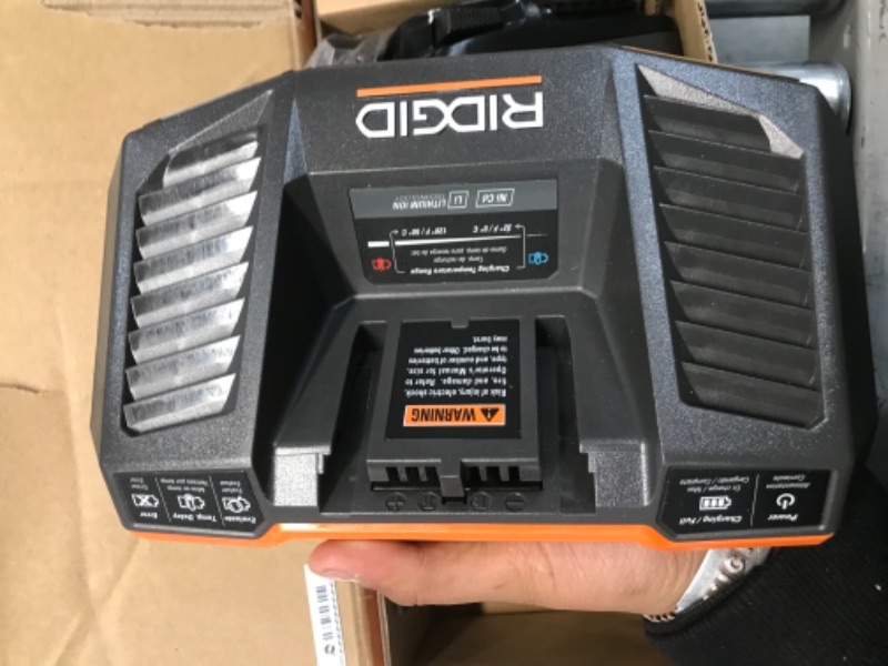 Photo 2 of RIDGID 18V Lithium-Ion MAX Output 4.0 Ah Battery and Charger Starter Kit
