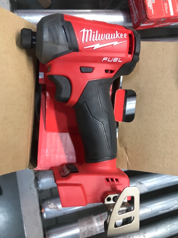 Photo 2 of Milwaukee M18 FUEL SURGE 18-Volt Lithium-Ion Brushless Cordless 1/4 in. Hex Impact Driver (Tool-Only)