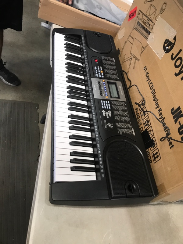 Photo 2 of Joymusic 61-Key Pack with Headphones,Microphone,Stand,Stool,and Power Supply-The Electronic Keyboards with The Joy trademarks are on Sale Randomly. (JK-61-KIT)
