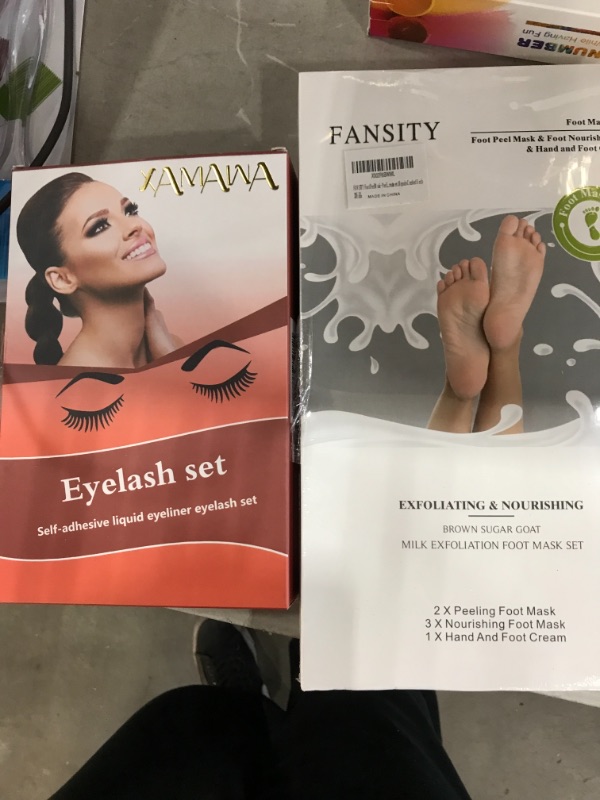 Photo 1 of not refundable foot mask and eye lash kit