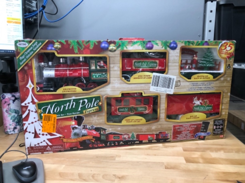 Photo 3 of Lionel North Pole Central Ready-to-Play Freight Set, Battery-powered Model Train Set with Remote Multi, 50 x 73"
