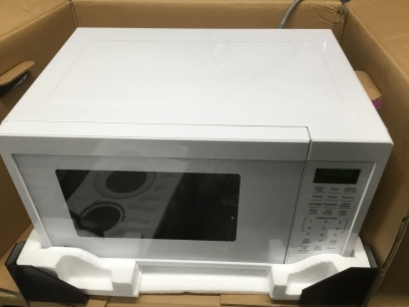 Photo 2 of GE
0.9 cu. ft. Countertop Microwave in White