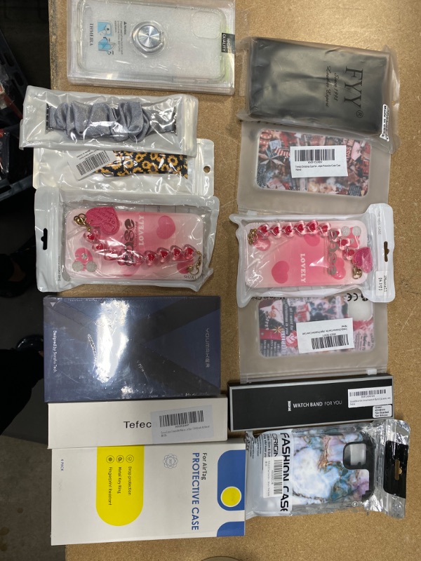 Photo 1 of **NON- REFUNDABLE** Assortment of iPhone 11 products, apple watch bands, airtag cases, 
 