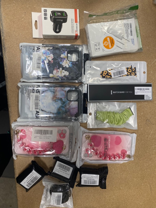 Photo 1 of **NON- REFUNDABLE** Assortment of iPhone 11 products, apple watch bands, airtag/airpod 1st gen cases, and chargers 13 pack 
