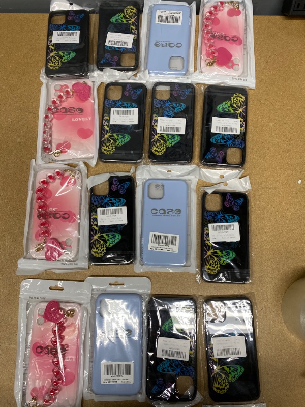 Photo 1 of *Non- Refundable* Assortment of Miscellaneous IPhone 11 Items, 16 pack with wireless headphones 5 pack 

