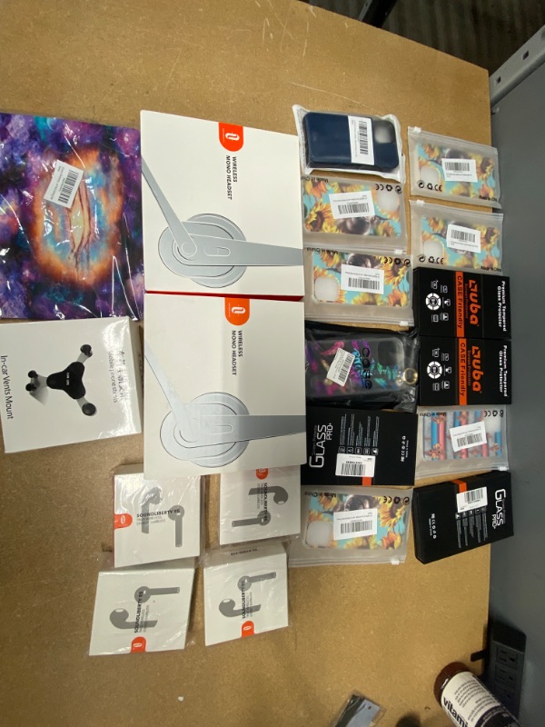 Photo 1 of *Non- Refundable* Assortment of Miscellaneous IPhone 13 Cases, Screen Protectors, Wireless headphones, Phone Holder and mouse pad, 20 Items 

