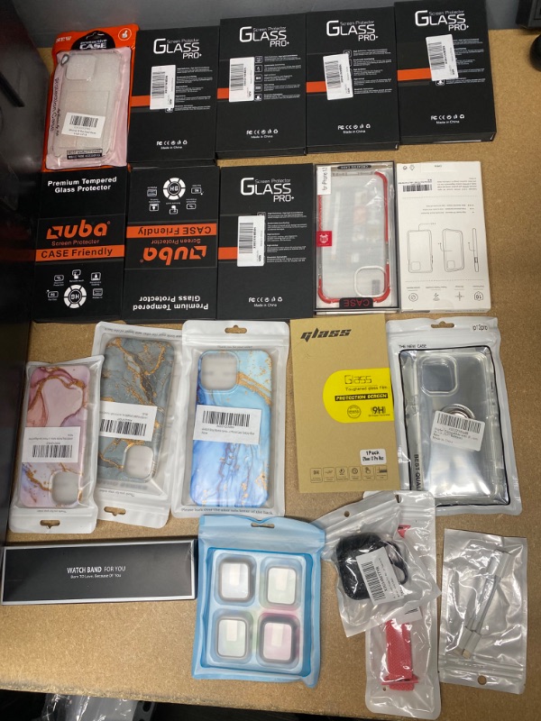 Photo 1 of *Non- Refundable* Assortment of Miscellaneous IPhone 13, watch and air pod Items 20 pack 

