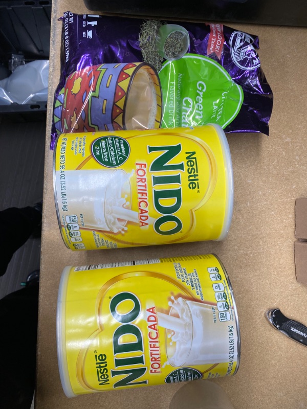 Photo 1 of *Non- Refundable* Assortment of Miscellaneous Drink Items 
- Big Train Chai Tea Latte Mix - 3.5 lb bags (Green Tea) exp 1/12/22
- Nestle Nido Fortified Evaporated Whole Milk - 56.3oz 3/31/22

