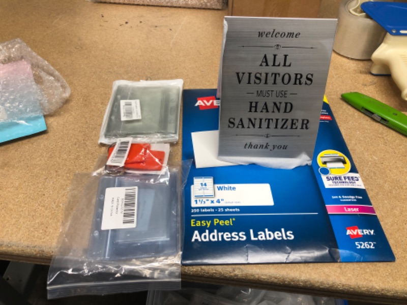 Photo 1 of *NON-REFUNDABLE* OFFICE SUPPLY BUNDLE 
CARD PROTECTORS,  ADDRESS LABELS, HAND SANITIZE SIGNS, AND LABELLED KEY RINGS