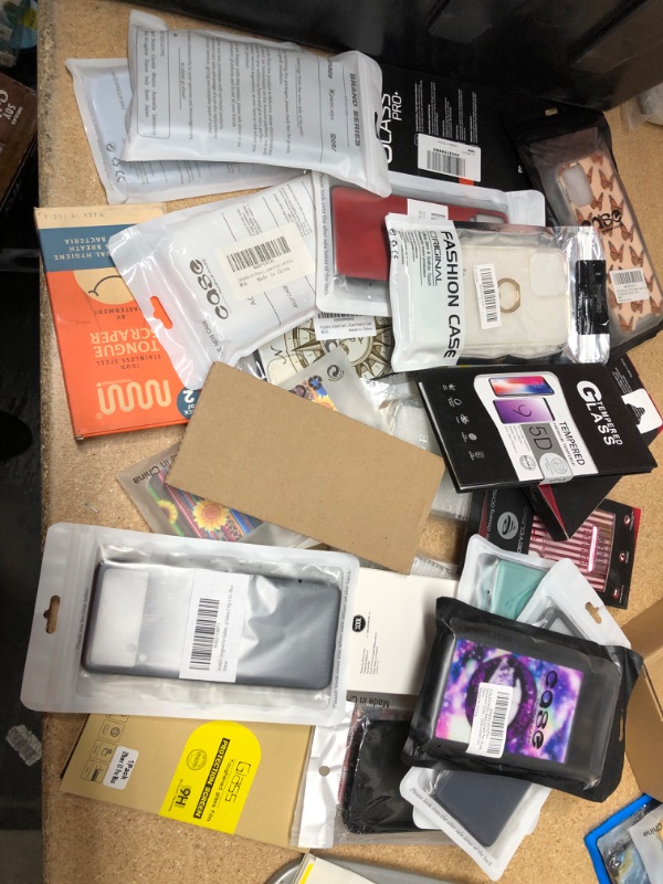 Photo 1 of **NOT REFUNDABLE** BUNDLE OF ASSORTED PHONE CASES AND GLASS SCREEN PROTECTORS 