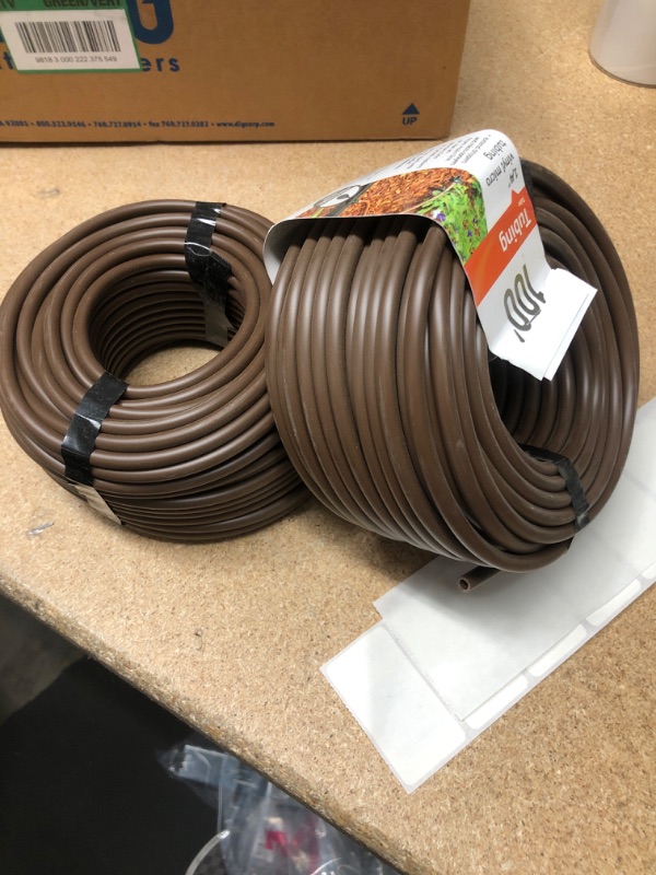 Photo 2 of **SETS OF 2**
Dig B38100 1/4" Vinyl Micro Drip Tubing, 100', Brown