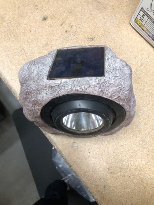 Photo 2 of ** ITS DUSTY/ HAS DIRT**
1-Light Solar Outdoor Integrated LED 3000K 30-Lumens Rock Spot Light