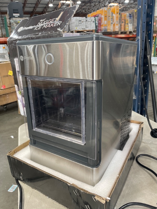 Photo 1 of **PARTS ONLY**DAMAGED**
GE Profile Opal | Countertop Nugget Ice Maker | Portable Ice Machine Complete with Bluetooth Connectivity | Smart Home Kitchen Essentials | Stainless Steel Finish | Up to 24 lbs. of Ice Per Day
