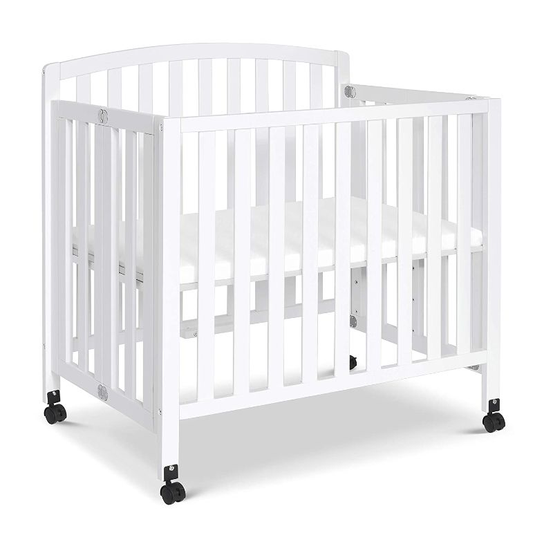 Photo 1 of DaVinci Dylan Folding Portable 3-in-1 Convertible Mini Crib and Twin Bed in White, Greenguard Gold Certified
