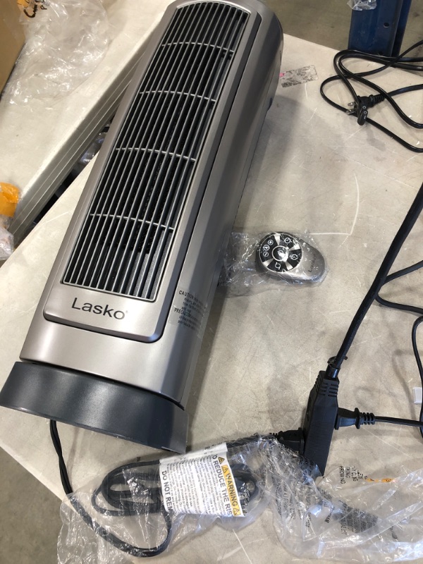 Photo 2 of Lasko 755320 Ceramic Tower Heater with Digital Display and Remote Control
