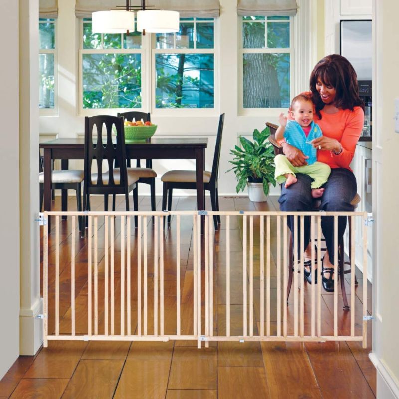 Photo 1 of Toddleroo by North States 103" Wide Extra Wide Swing Baby Gate: Perfect for Oversized Spaces. No Threshold. One Hand Operation. Hardware Mount. Fits 60"- 103" Wide (27" Tall, Sustainable Hardwood)