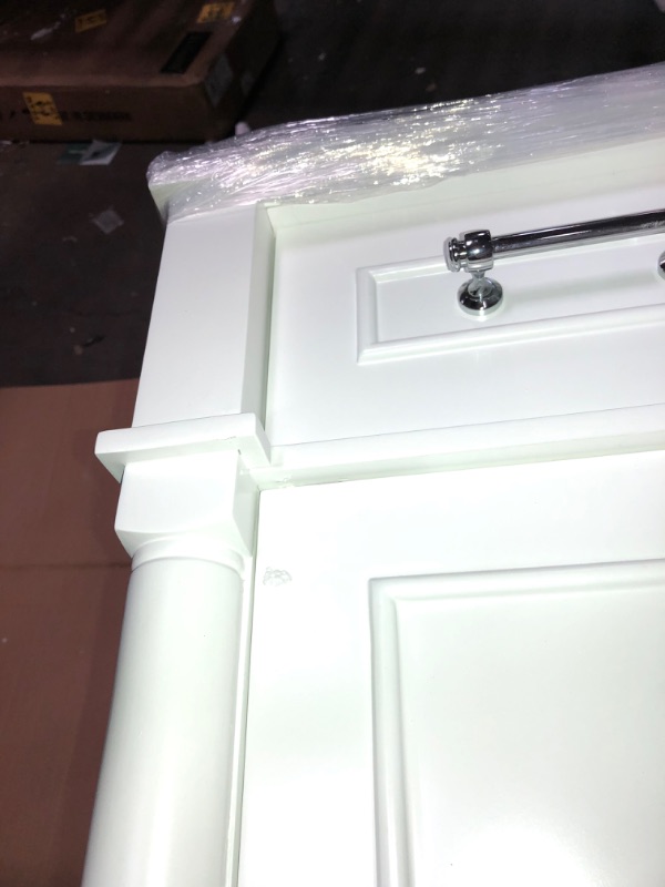 Photo 3 of *Damage shown in picture*
Home Decorators Collection Aberdeen 48 in. W X 22 in. D Vanity in White with Carrara Marble Top with White Sink
