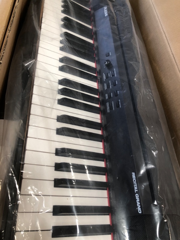 Photo 4 of Alesis Recital Grand - 88 Key Digital Piano with Full Size Graded Hammer Action Weighted Keys, Multi-Sampled Sounds, Speakers, FX and 128 Polyphony
