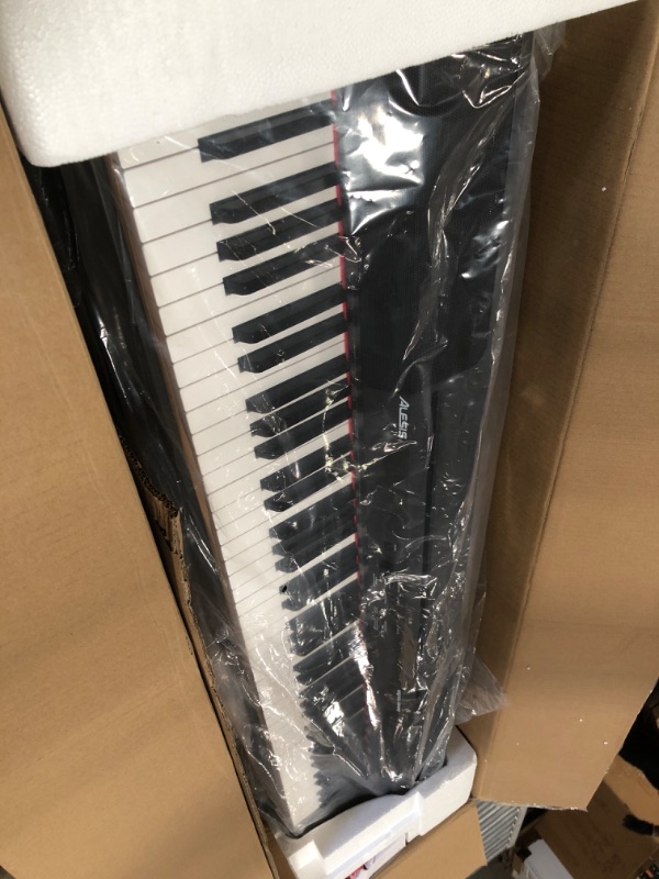 Photo 3 of Alesis Recital Grand - 88 Key Digital Piano with Full Size Graded Hammer Action Weighted Keys, Multi-Sampled Sounds, Speakers, FX and 128 Polyphony
