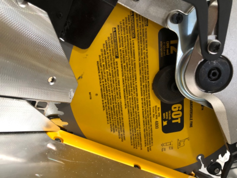 Photo 4 of (Circuit blown when powered on and motor smoked) 
DEWALT Miter Saw, 12-Inch, Double Bevel, Compound, XPS Cutline, 15-Amp with w/Safety Goggle (DWS716XPS & DPG82-11C)