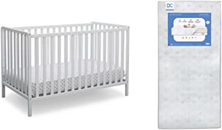 Photo 1 of Delta Children Heartland 4-in-1 Convertible Crib, Bianca White + Delta Children Twinkle Galaxy Dual Sided Recycled Fiber Core Crib and Toddler Mattress (Bundle)
