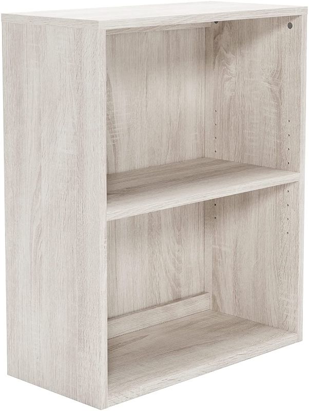 Photo 1 of ***STOCK PHOTO FOR REFERENCE ONLY****
Signature Design by Ashley Dorrinson Bookcase, 1 Shelf, Whitewash 
Dimensions: 11.63"D x 24.63"W x 30"H