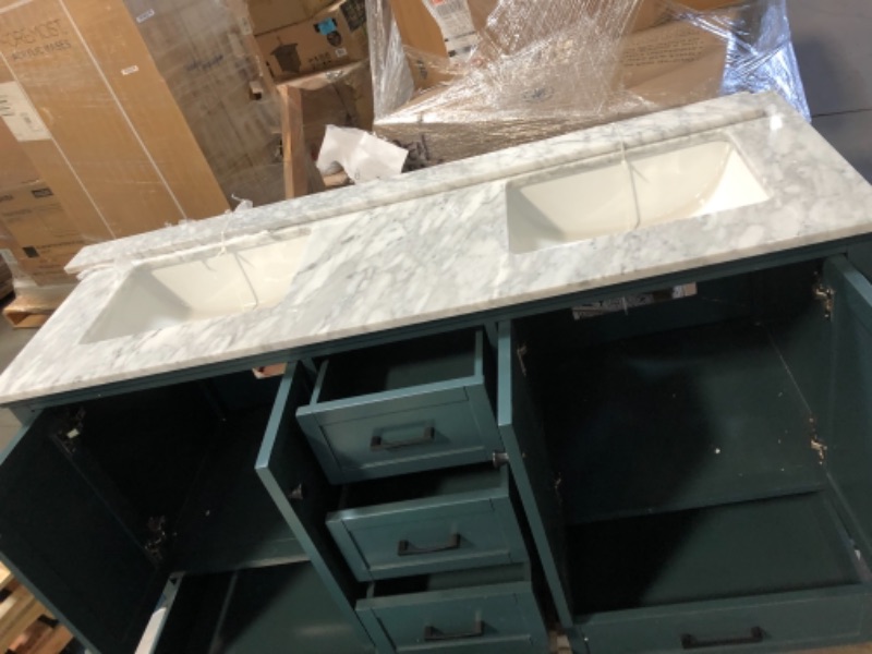 Photo 10 of "**BACK PANEL ON BATHROOM VANITY IS BROKEN IN 2 DIFFERENT AREAS, REFER TO PHOTO,LEFT CABINET DOORS CAVE INWARD, COUNTER ON RIGHT SIDE SINK HAS TWO ULTRA FINE FRACTURES**
Merryfield 61 in. W x 22 in. D x 35 in. H Bathroom Vanity in Antigua Green with Carra