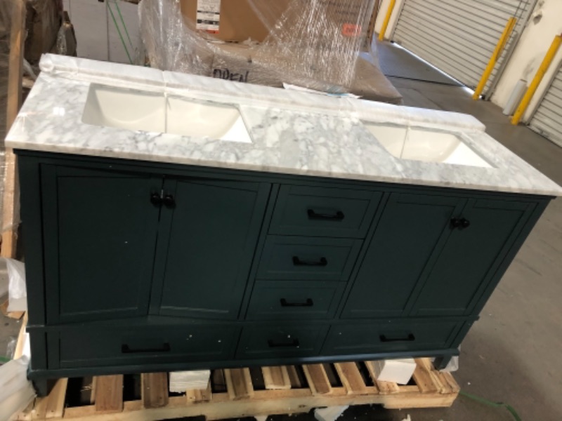 Photo 7 of "**BACK PANEL ON BATHROOM VANITY IS BROKEN IN 2 DIFFERENT AREAS, REFER TO PHOTO,LEFT CABINET DOORS CAVE INWARD, COUNTER ON RIGHT SIDE SINK HAS TWO ULTRA FINE FRACTURES**
Merryfield 61 in. W x 22 in. D x 35 in. H Bathroom Vanity in Antigua Green with Carra