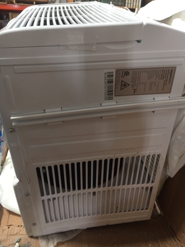 Photo 6 of Amazon Basics Window-Mounted Air Conditioner with Remote - Cools 550 Square Feet, 12000 BTU, Energy Star
