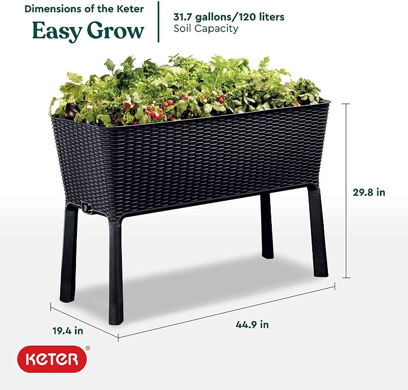 Photo 1 of *SEE last picture for damage* 
Keter Easy 31.7 Gallon Raised Garden Bed with Self Watering Planter Box and Drainage Plug-Perfect for Growing Fresh Vegetables, Flowers and Herbs, Graphite
