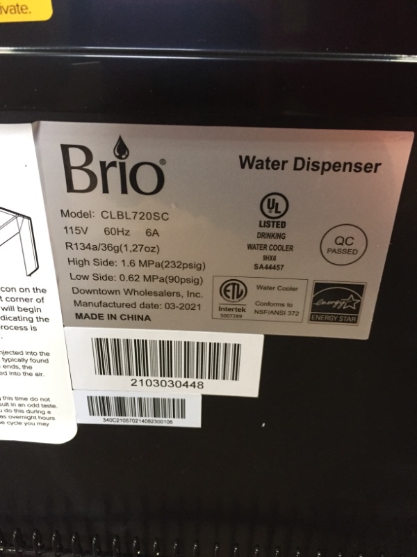 Photo 6 of *SEE last picture for damage* 
Brio Moderna Bottom Load Water Cooler Dispenser - Tri-Temp, Adjustable Temperature, Self-Cleaning, Touch Dispense, Child Safety Lock, Holds 3 or 5 Gallon Bottles, Digital Display and LED Light
