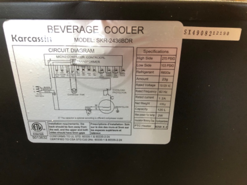 Photo 2 of (INCOMPLETE SET OF FEET; DENTED BOTTOM CORNER) 
Karcassin 24 Inch Wine and Beverage Refrigerator