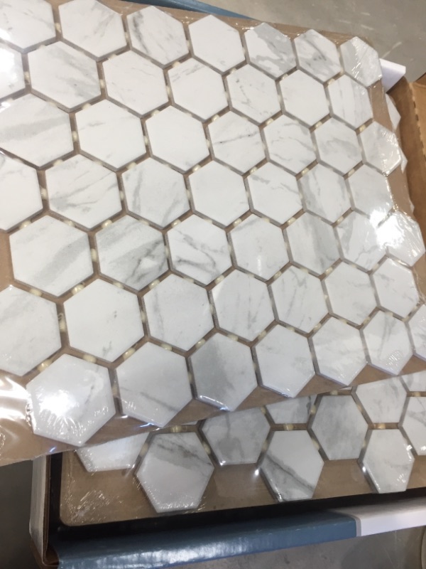 Photo 2 of **ONE BOX OF 12* Lifeproof
Carrara 10 in. x 12 in. x 6.35 mm Ceramic Hexagon Mosaic Floor and Wall Tile (0.81 sq. ft./Each) **roughly 109sq ft**