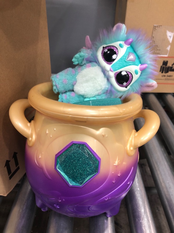 Photo 2 of Magic Mixies Magical Misting Cauldron with Interactive 8 inch Blue Plush Toy and 50+ Sounds and Reactions, Multicolor
