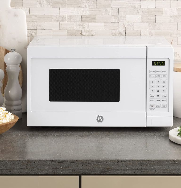 Photo 1 of GE Countertop Microwave Oven | 0.7 Cubic Feet Capacity, 700 Watts | Kitchen Essentials for the Countertop or Dorm Room | White
