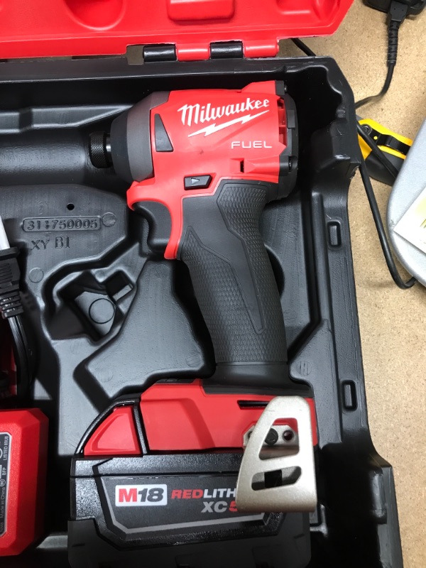 Photo 1 of M18 FUEL SURGE 18-Volt Lithium-Ion Brushless Cordless 1/4 in. Hex Impact Driver Compact Kit with Two 5.0 Ah Batteries...
**Product Is Brand New** - **Retail Packaging Maybe Opened or Damaged**